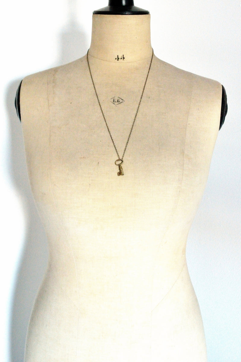 products/tiny-bronze-skeleton-key-necklace-04.jpg